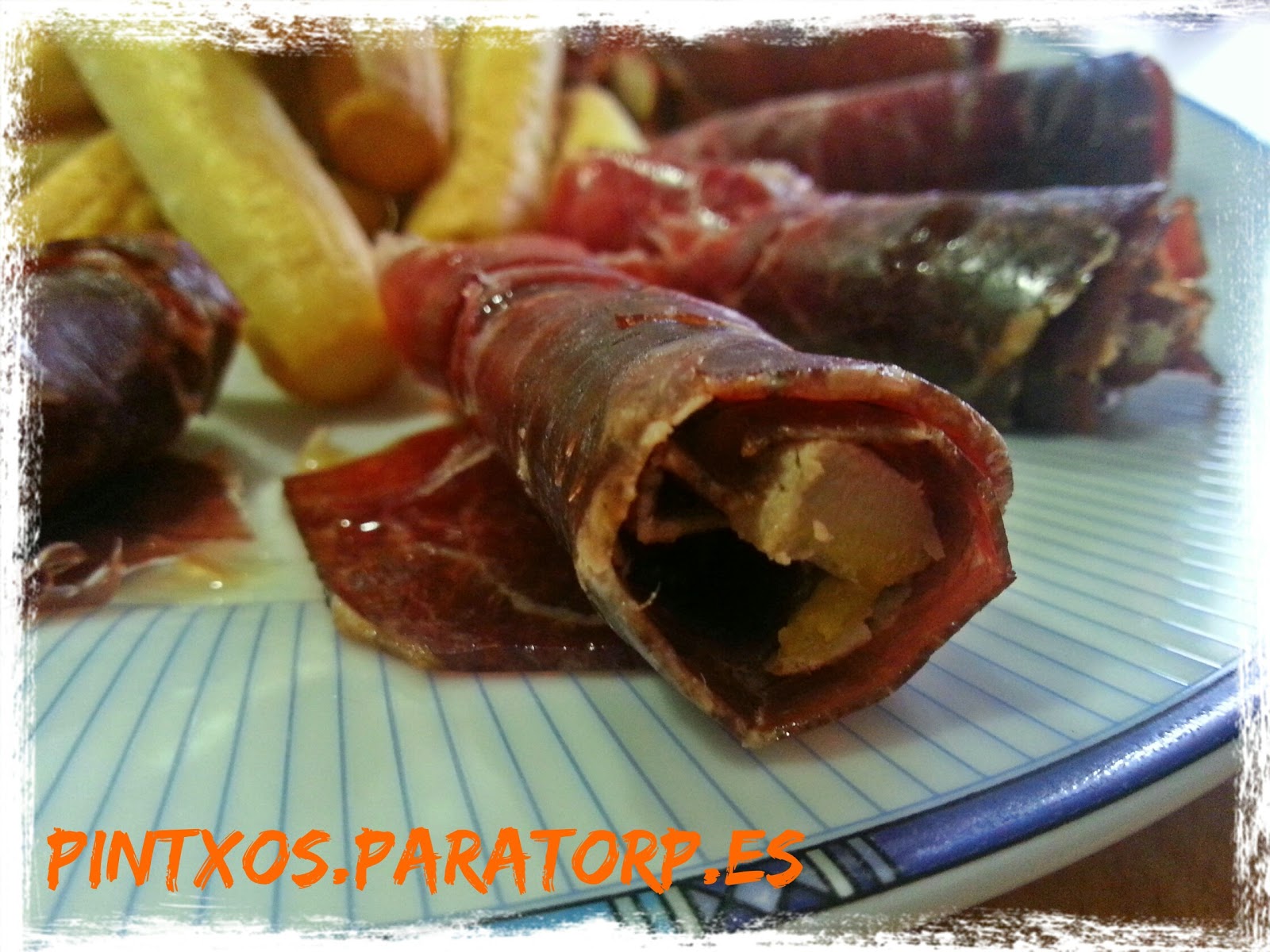 Rollitos de cecina y mouse de pato